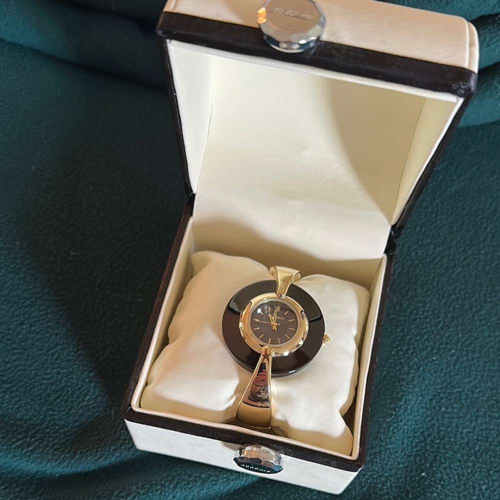 BCBGirls Gold and Black Bracelet Watch.  New without tags with New battery.